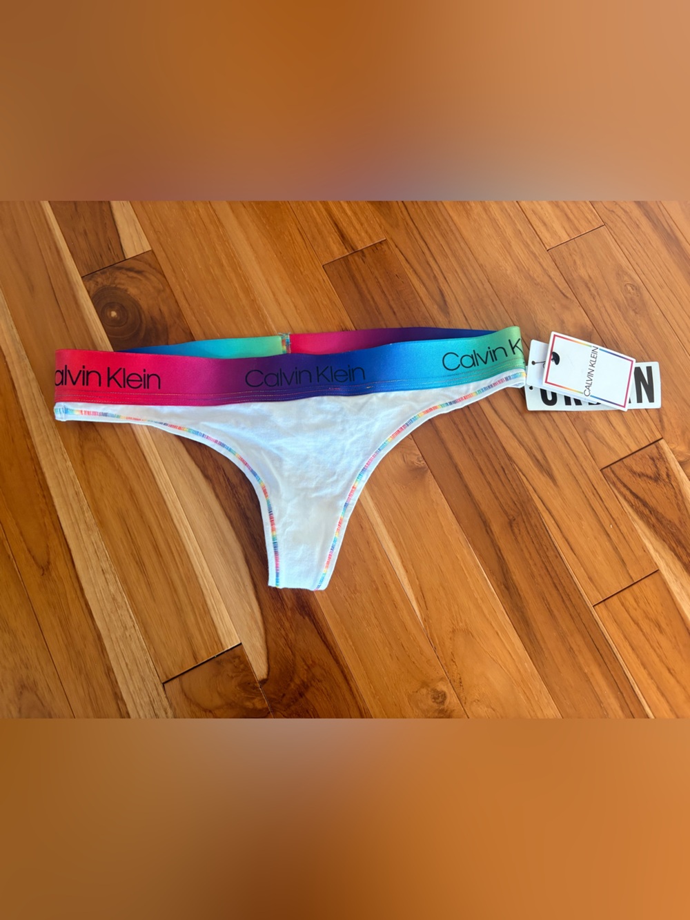 Calvin Klein White Thong with Rainbow Elastic Waistband